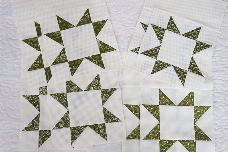 Jelly Snowflake Mystery Quilt Block 2 featured by Top US Quilt Blog, A Quilting Life: image of Christmas Star blocks