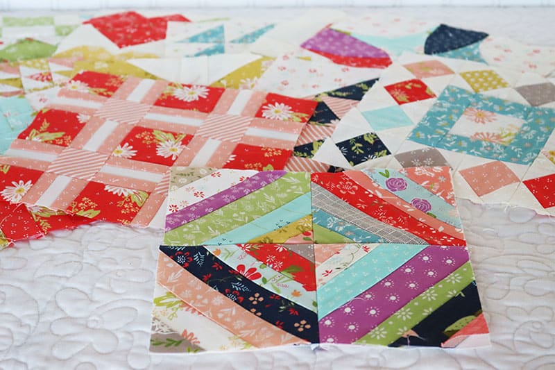 Moda Block Heads 3 Block 40 featured by Top US Quilting Blog, A Quilting Life: image of scrappy quilt blocks