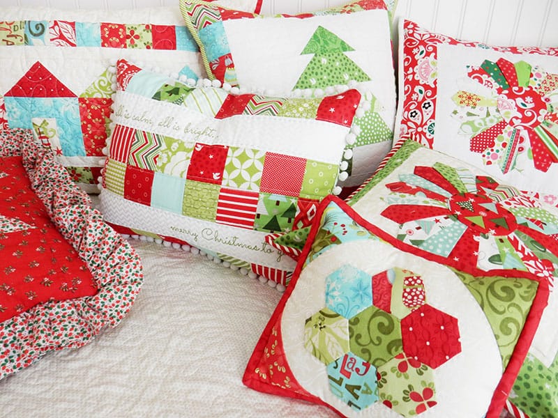 Saturday Seven 158 featured by Top US Quilting Blog, A Quilting Life: image of Christmas pillows