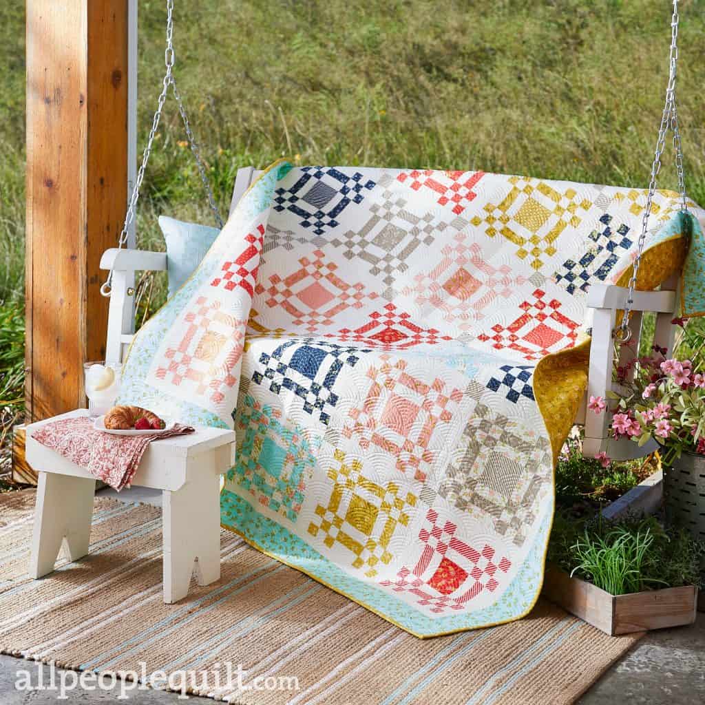 Nine-Patch Square Dance Quilt featured by Top US Quilting Blog, A Quilting Life