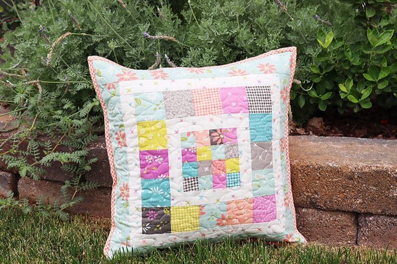 Scrappy Patchwork Pillow Tutorial + Video featured by Top US Quilting Blog, A Quilting Life