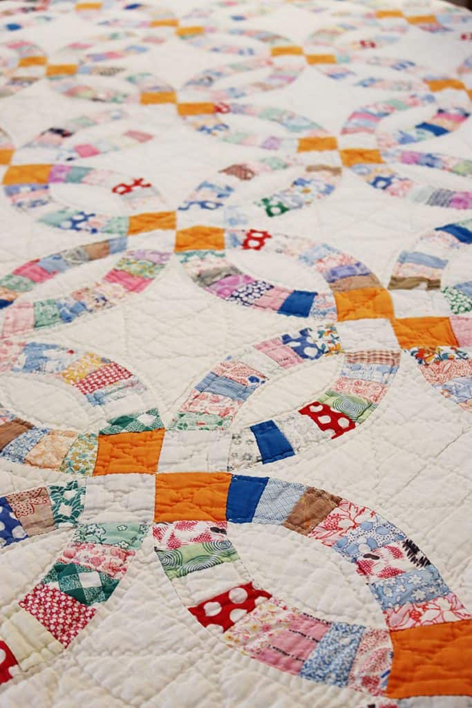 Antique Double Wedding Ring Quilt featured by Top US Quilt Blog, A Quilting Life