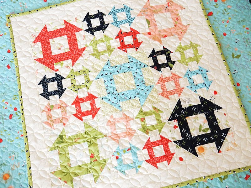 Mini Churn Dash Quilt featured by Top US Quilt Blog, A Quilting Life