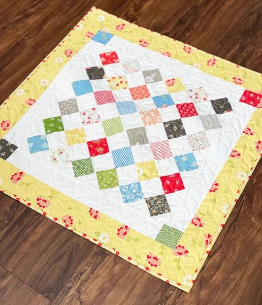 Quilted Candy Table Topper featured by Top US Quilt Blog, A Quilting Life