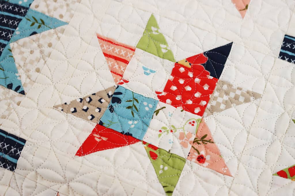 Scrappy Sawtooth Star Quilt Block featured by Top US Quilt Blog, A Quilting Life