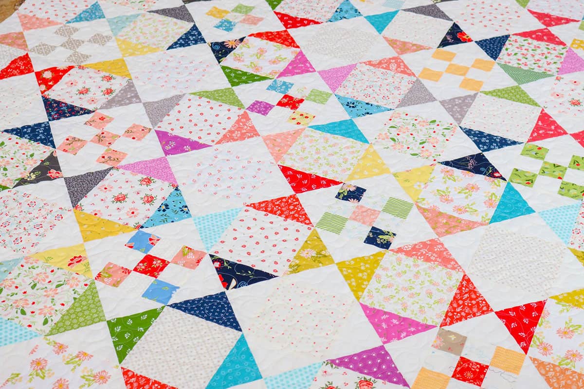 Simple Scrappy Quilt with Free Pattern featured by Top US Quilt Blog, A Quilting Life
