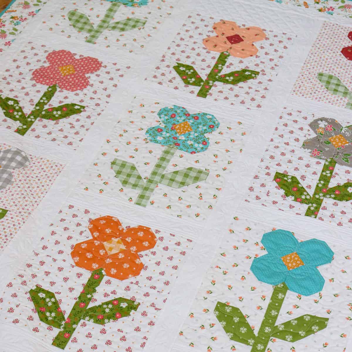 Flower Shoppe Quilt + Mini Quilt featured by Top US Quilt Blog, A Quilting Life