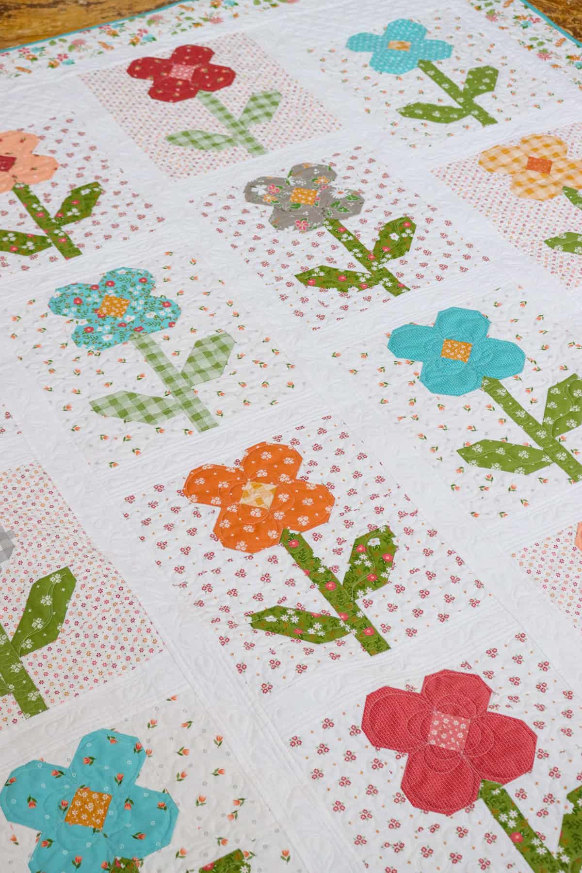Flower Shoppe Quilt + Mini Quilt featured by Top US Quilt Blog, A Quilting Life