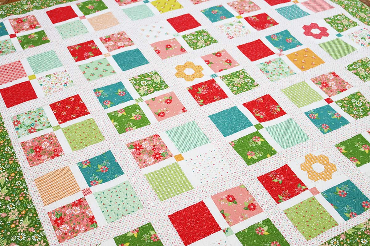 Scrappy cotton quilt in bright colors