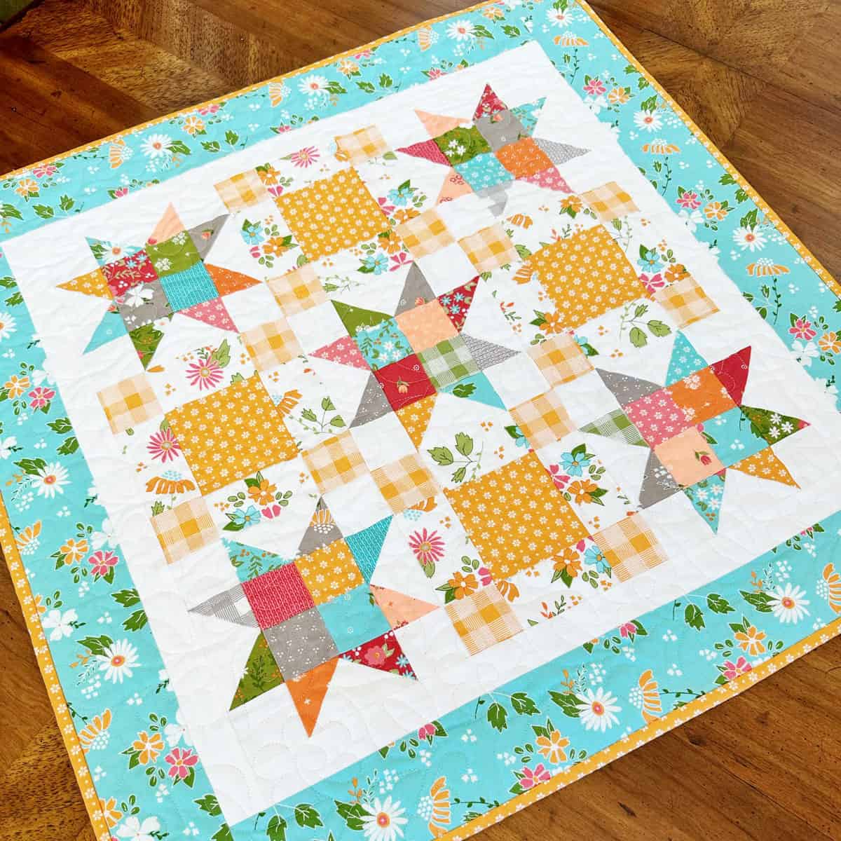 Quilted stars and patchwork table topper