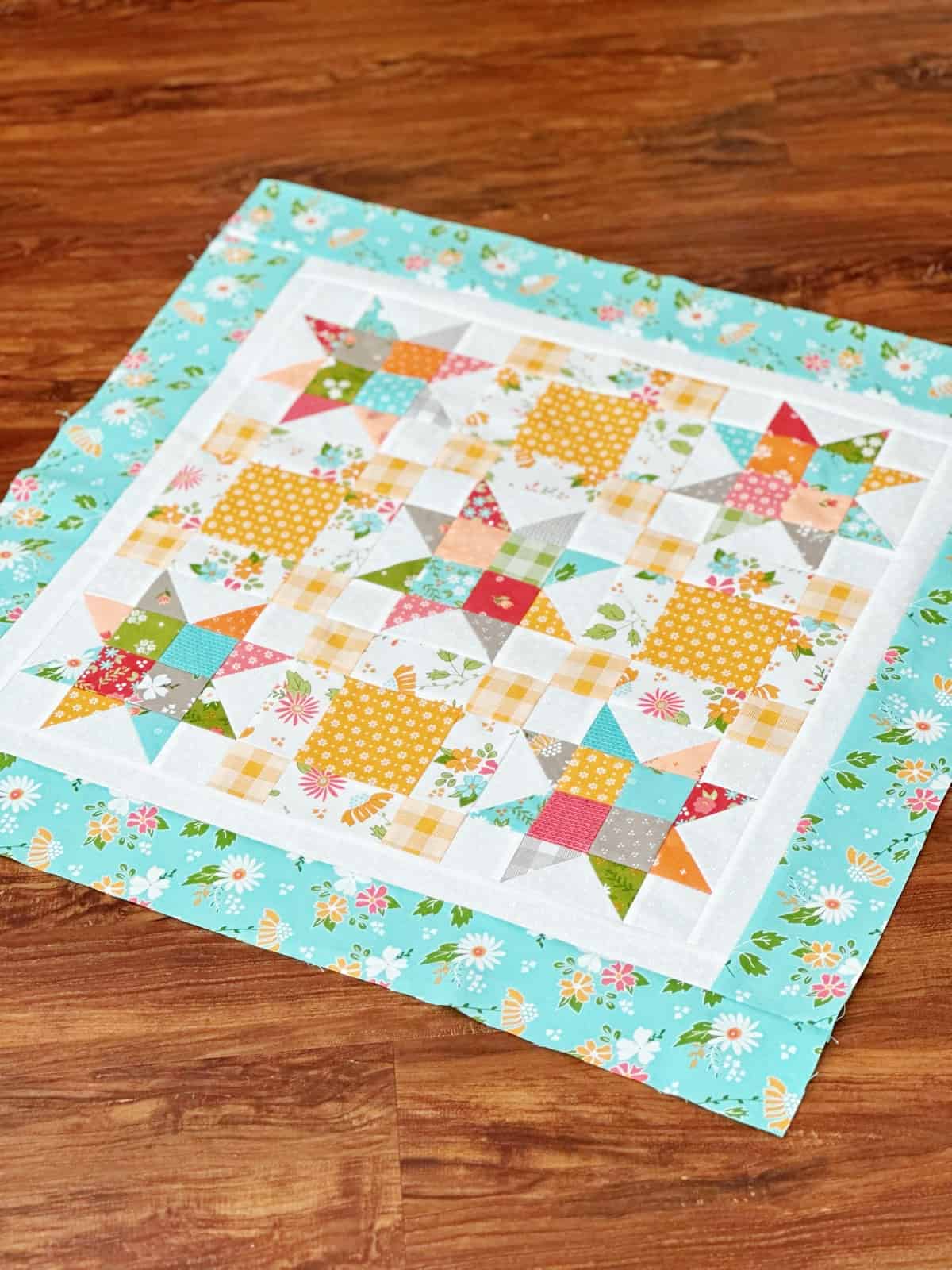 Patchwork stars quilt top is bright fall colors