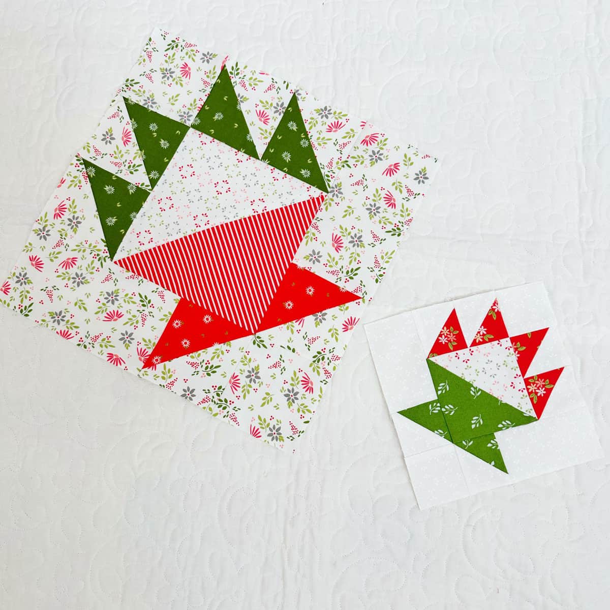 Christmas fabric quilt blocks in a variety of designs.