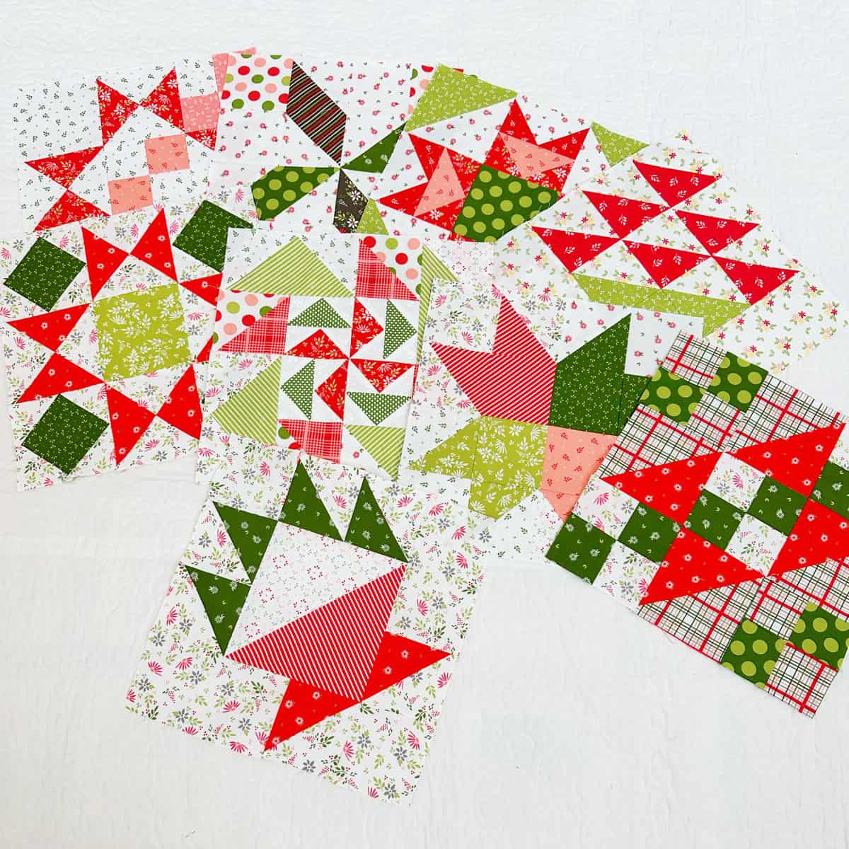 Christmas fabric quilt blocks in a variety of designs.