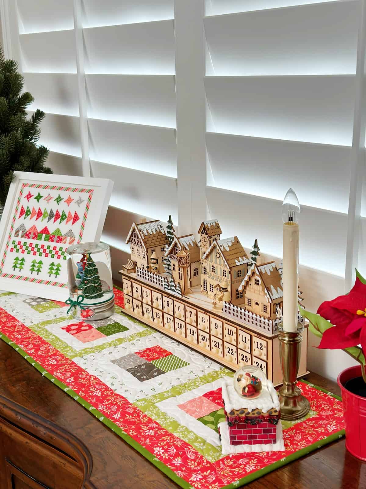 Christmas display with framed stitcher and advent display