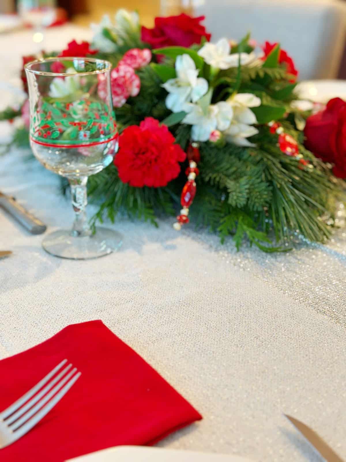Christmas floral arrangement on table