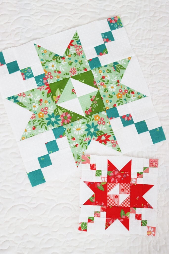 Moda Blockheads 5 quilt blocks in red and pink and blue, green, and aqua.
