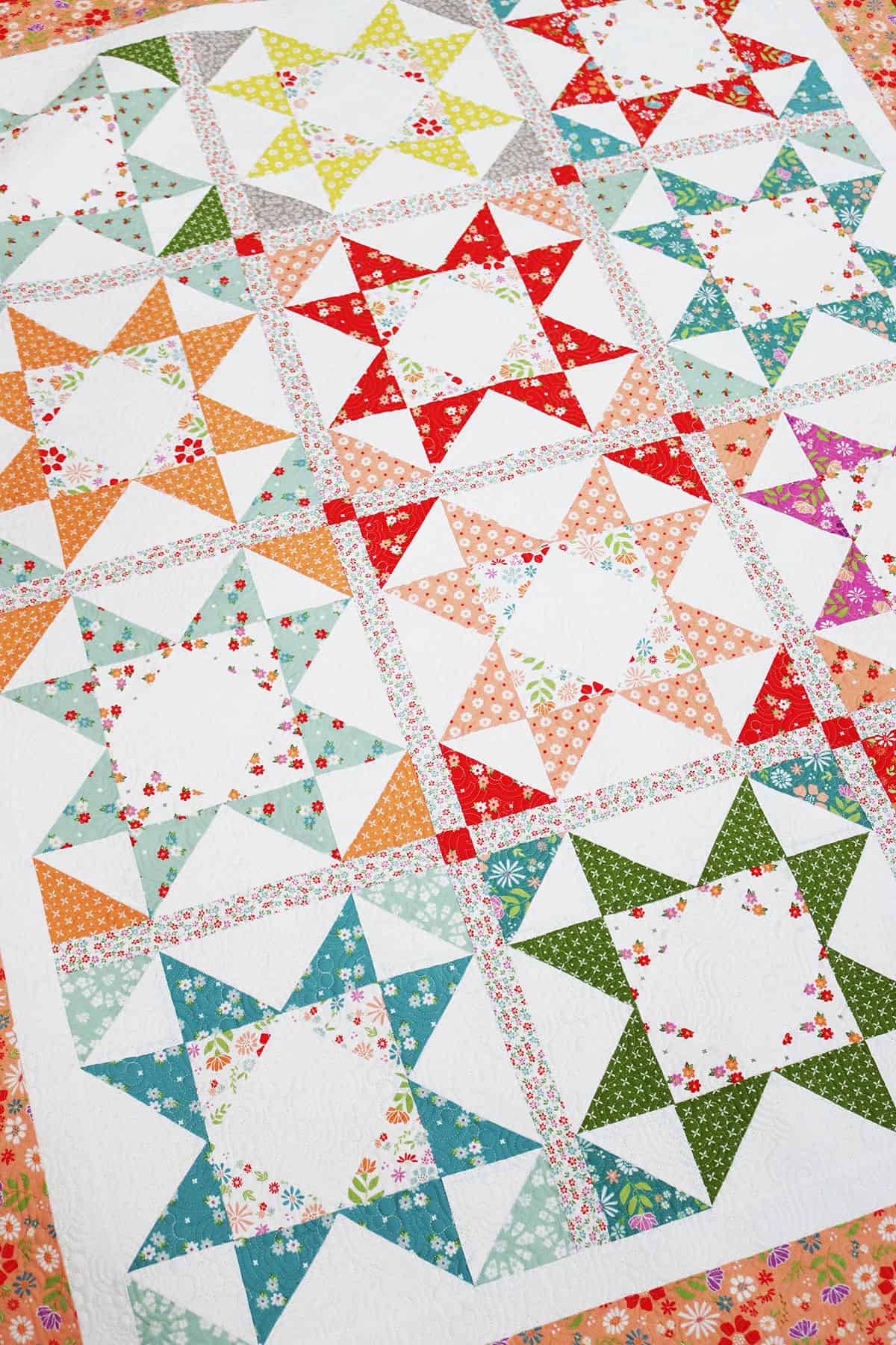 Starry Eyed Lap Quilt in Laguna Sunrise fabrics by Sherri & Chelsi for Moda fabrics