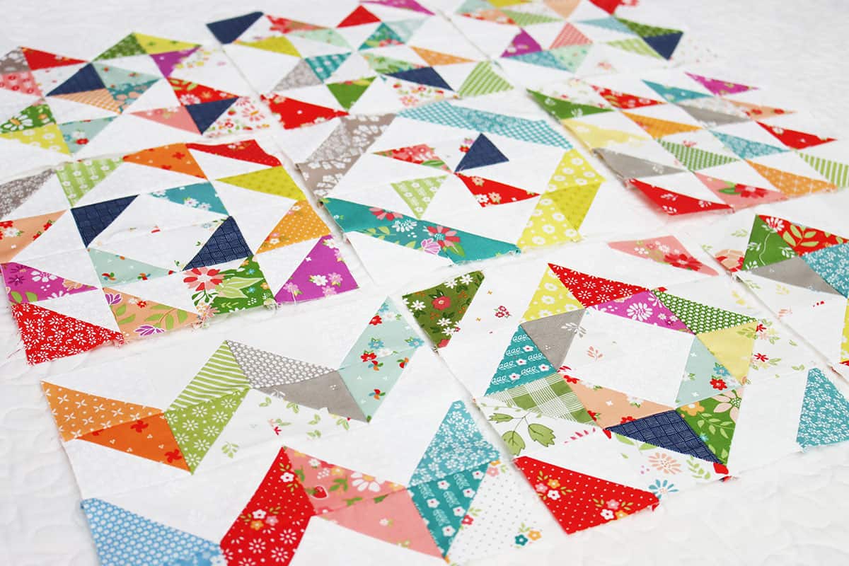 Scrappy Half Square Triangle Quilt Blocks by Sherri from A Quilting Life