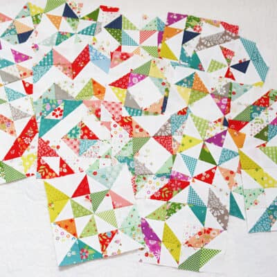Scrappy half square triangle quilt blocks by Sherri from A Quilting Life