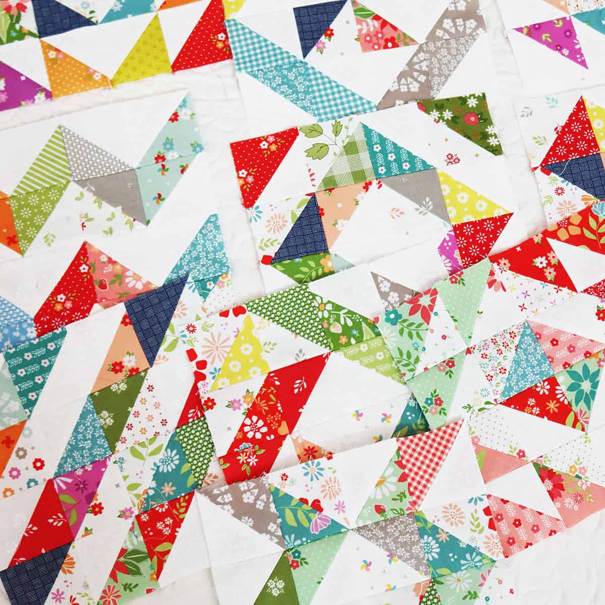 Scrappy Half Square Triangle Blocks by Sherri from A Quilting Life