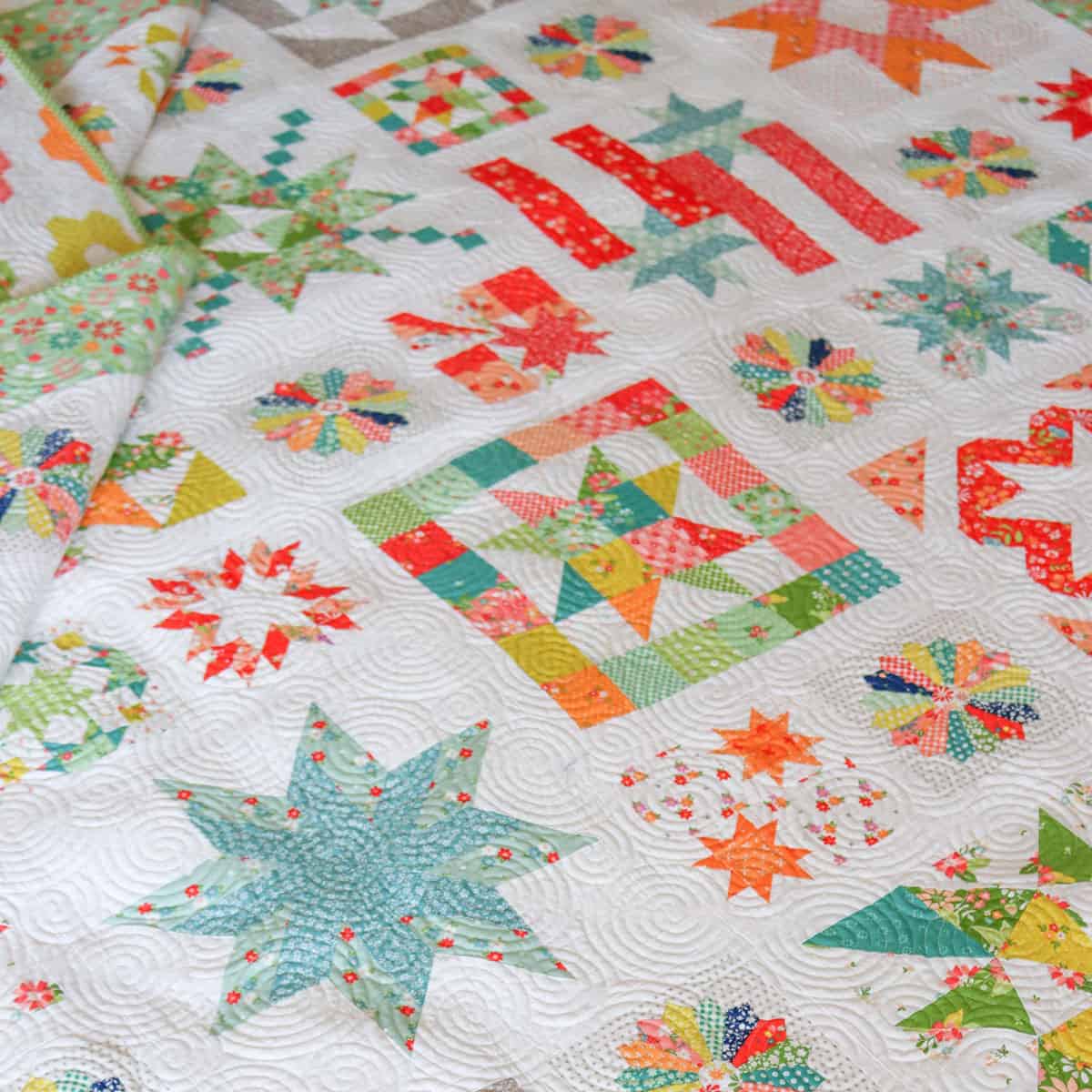 Moda Blockheads 5 quilt by Sherri McConnell from A Quilting Life with Strawberry Lemonade, Laguna Sunrise, and Raspberry Summer fabrics