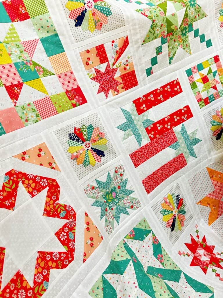 Blockheads 5 quilt by Sherri from A Quilting Life with fabrics from Strawberry Lemonade, Laguna Sunrise, and Raspberry Summer fabrics by Sherri & Chelsi for Moda