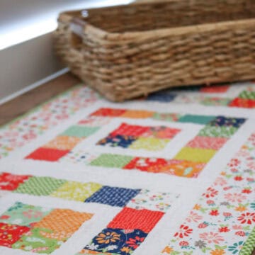 County Fair Table Runner in Raspberry Summer Fabrics by Sherri from A Quilting Life