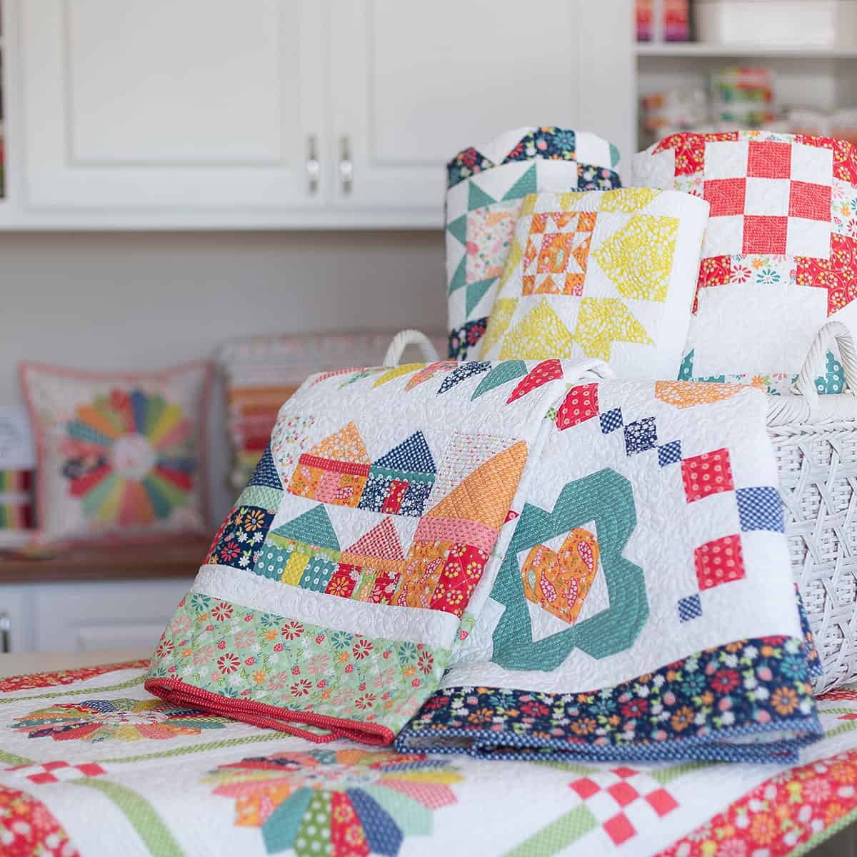 Raspberry Summer Quilts by Sherri McConnell from A Quilting Life in a basket