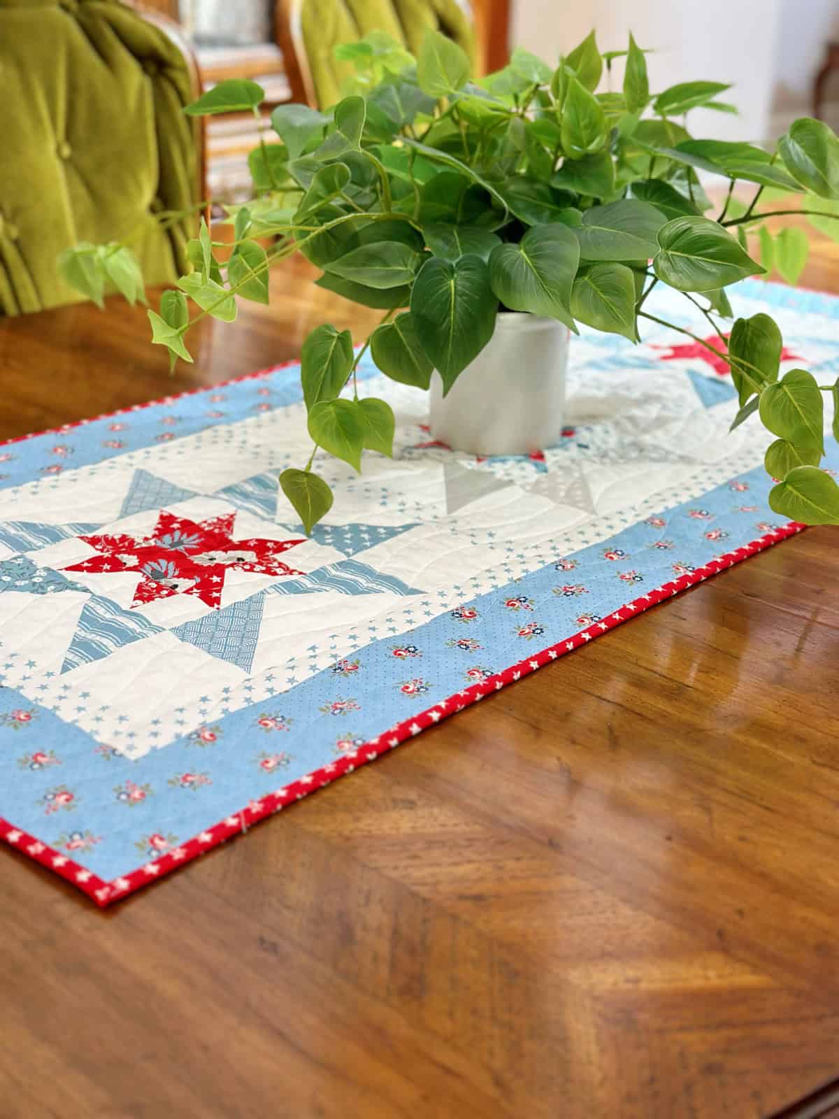 Stars in Summer Table Runner by Sherri McConnell of A Quilting Life