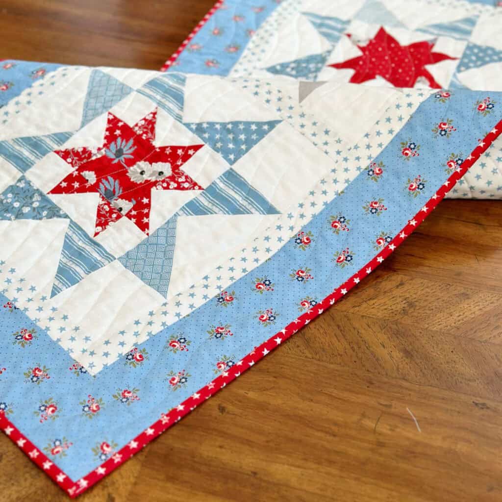 Stars in Summer Table Runner by Sherri McConnell of A Quilting Life