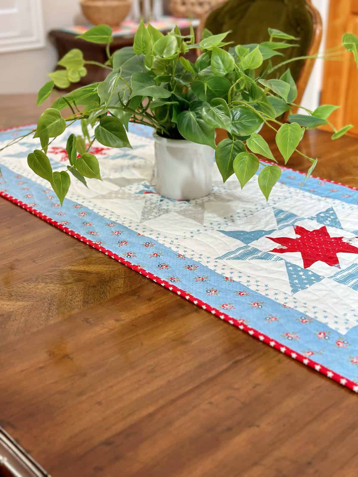 Stars in Summer Table Runner by Sherri McConnell of A Quilting Life