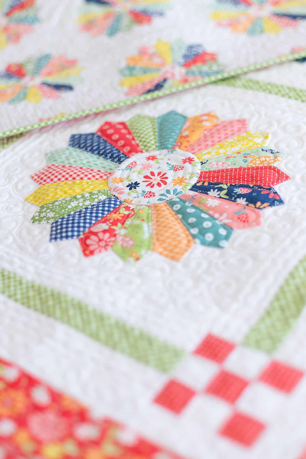 Dresden Quilt Block in Raspberry Summer Fabrics by Sherri & Chelsi for Moda Fabrics