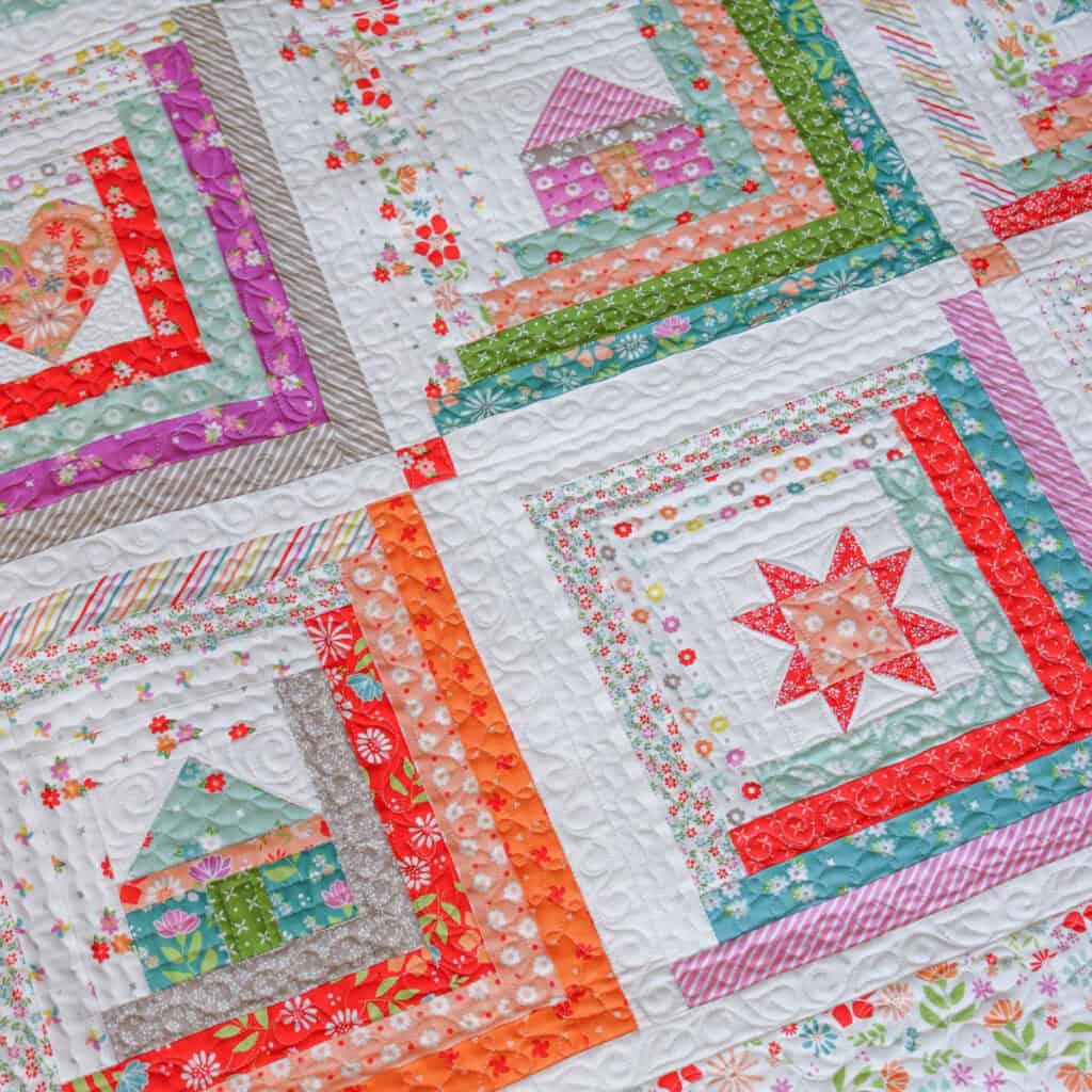 Heart of the Home quilt in Laguna Sunrise fabrics by Sherri McConnell of A Quilting Life