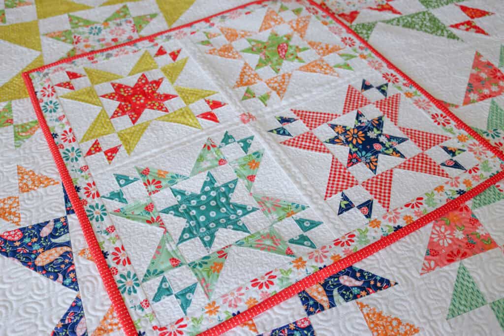 Star Bright mini and Star Bright 2 quilt in Raspberry Summer Fabrics