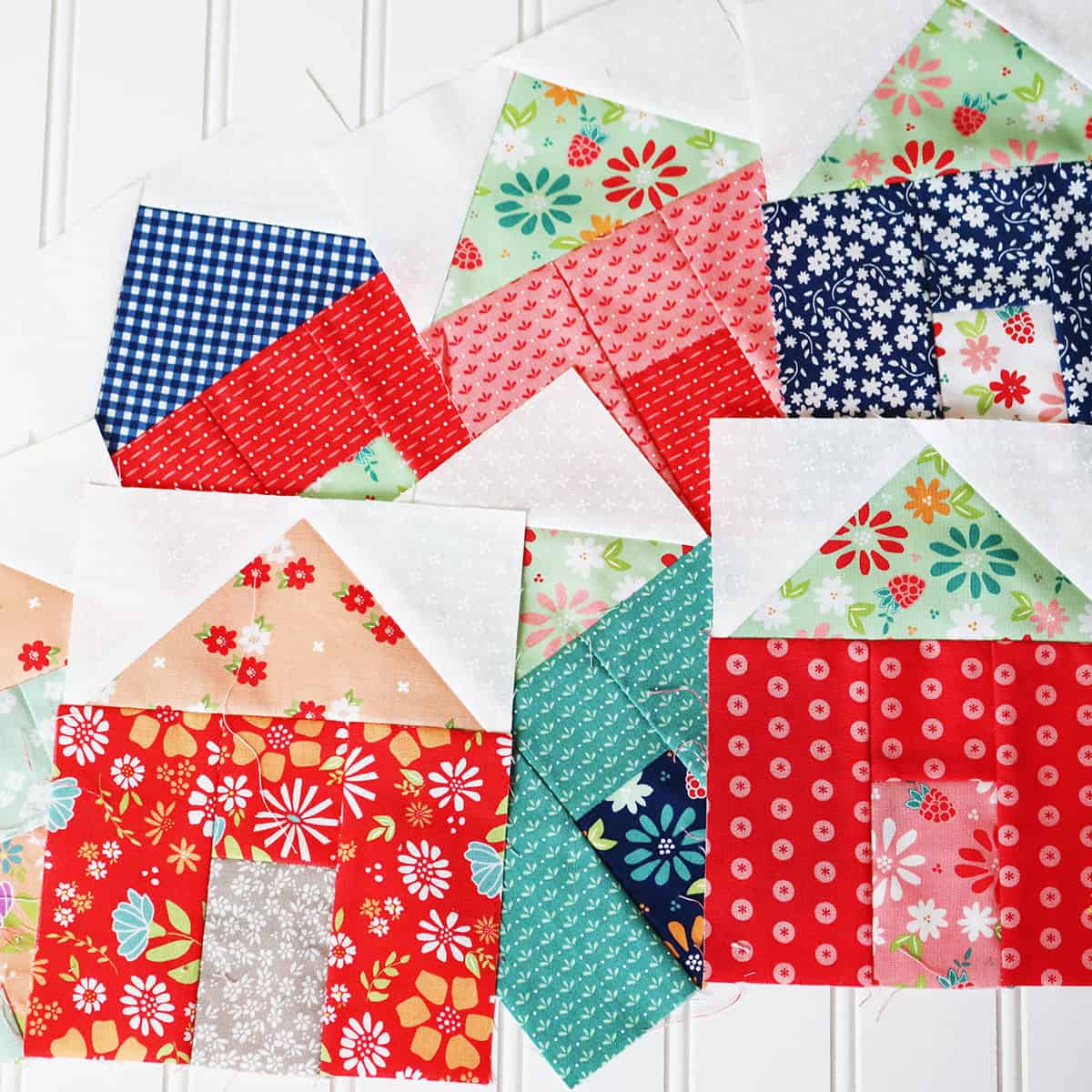 Village Houses in Raspberry Summer fabrics by Sherri & Chelsi for Moda Fabrics