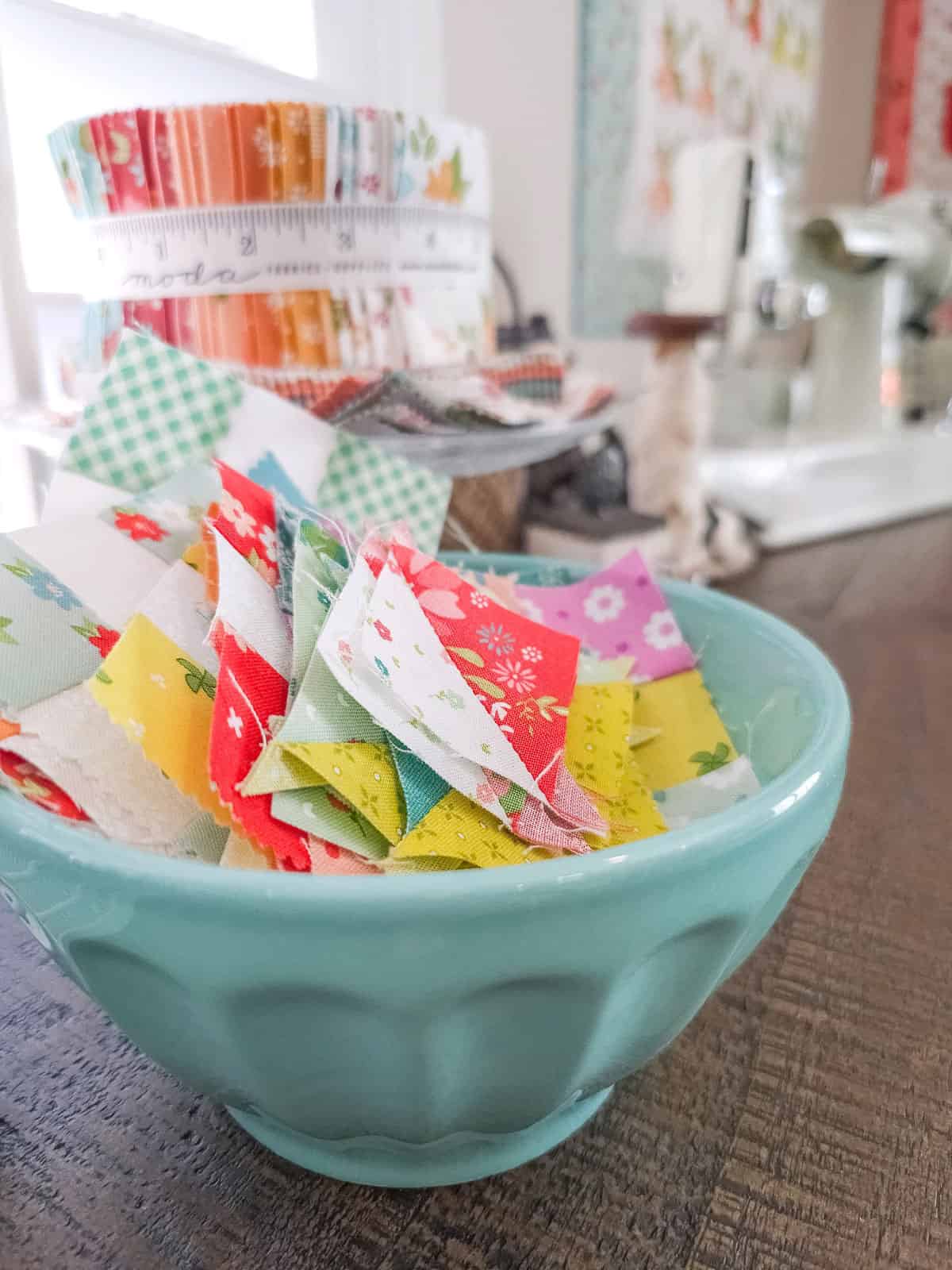 Fabric bits in an aqua bowl