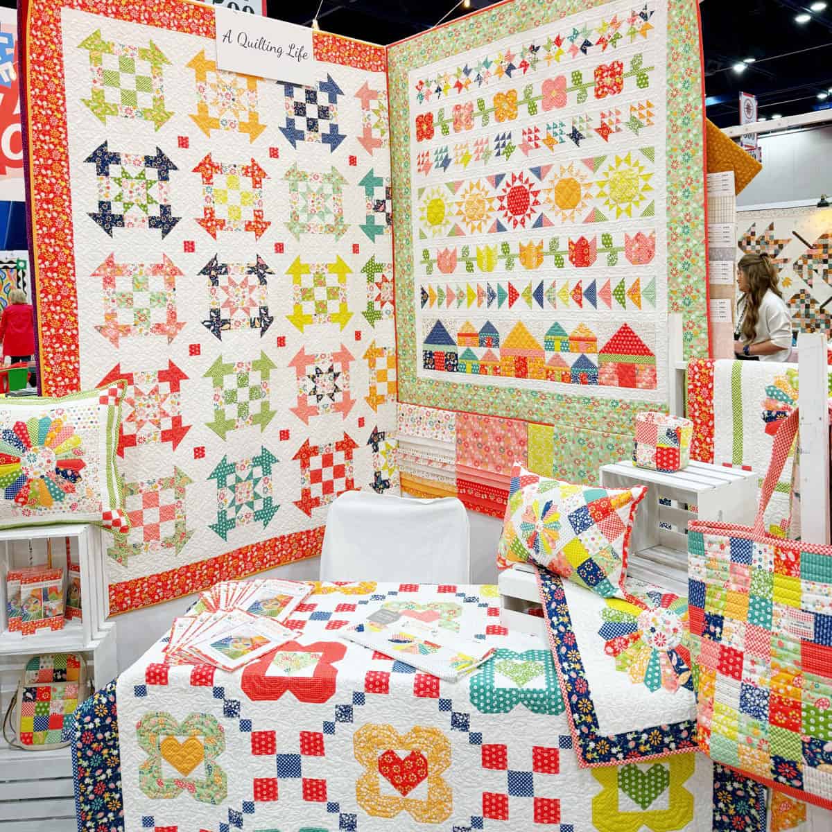 A Quilting Life Raspberry Summer Booth at International Quilt Market in Houston, Texas USA October 2024