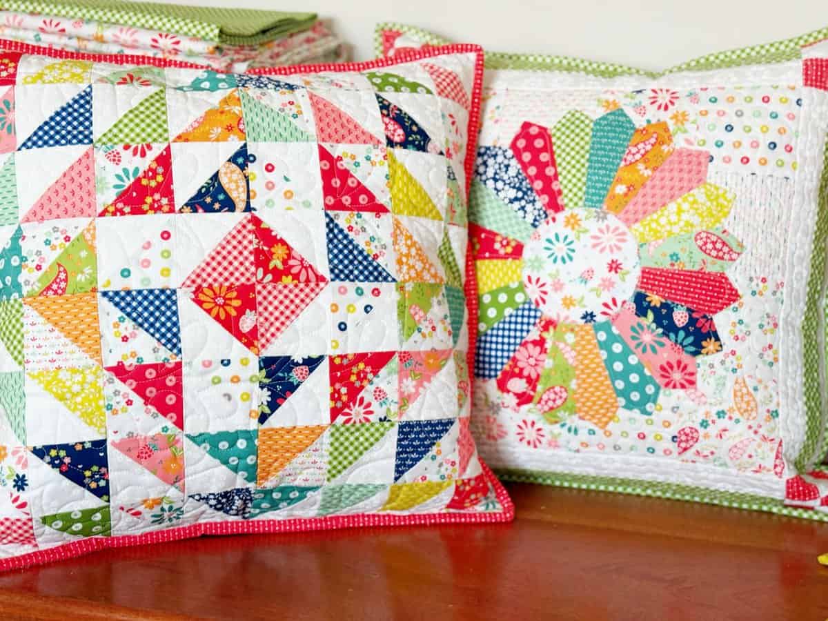 Half-Square Triangle Pillow and Dresden pillow in Raspberry Summer Fabrics by Sherri & Chelsi for Moda Fabrics.