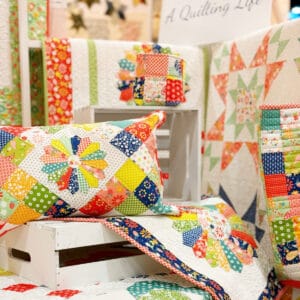Closeup of the A Quilting Life booth from International Quilt Market Fall 2024 in Houston, Texas