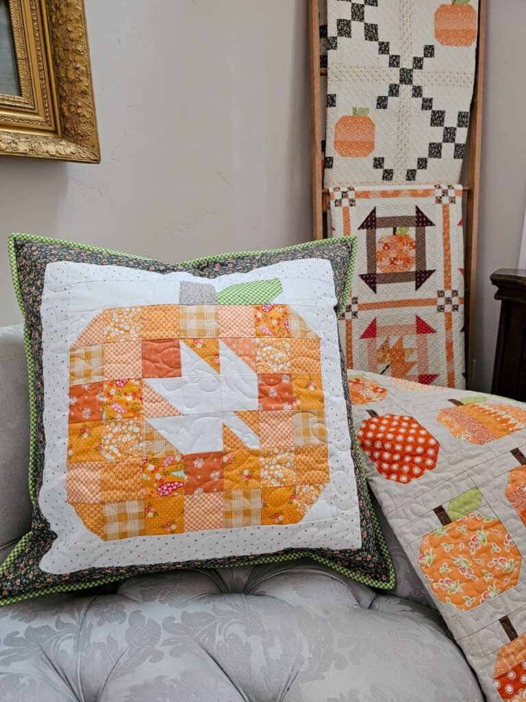 Large patchwork pumpkin pillow pieced by Sherri from A Quilting Life