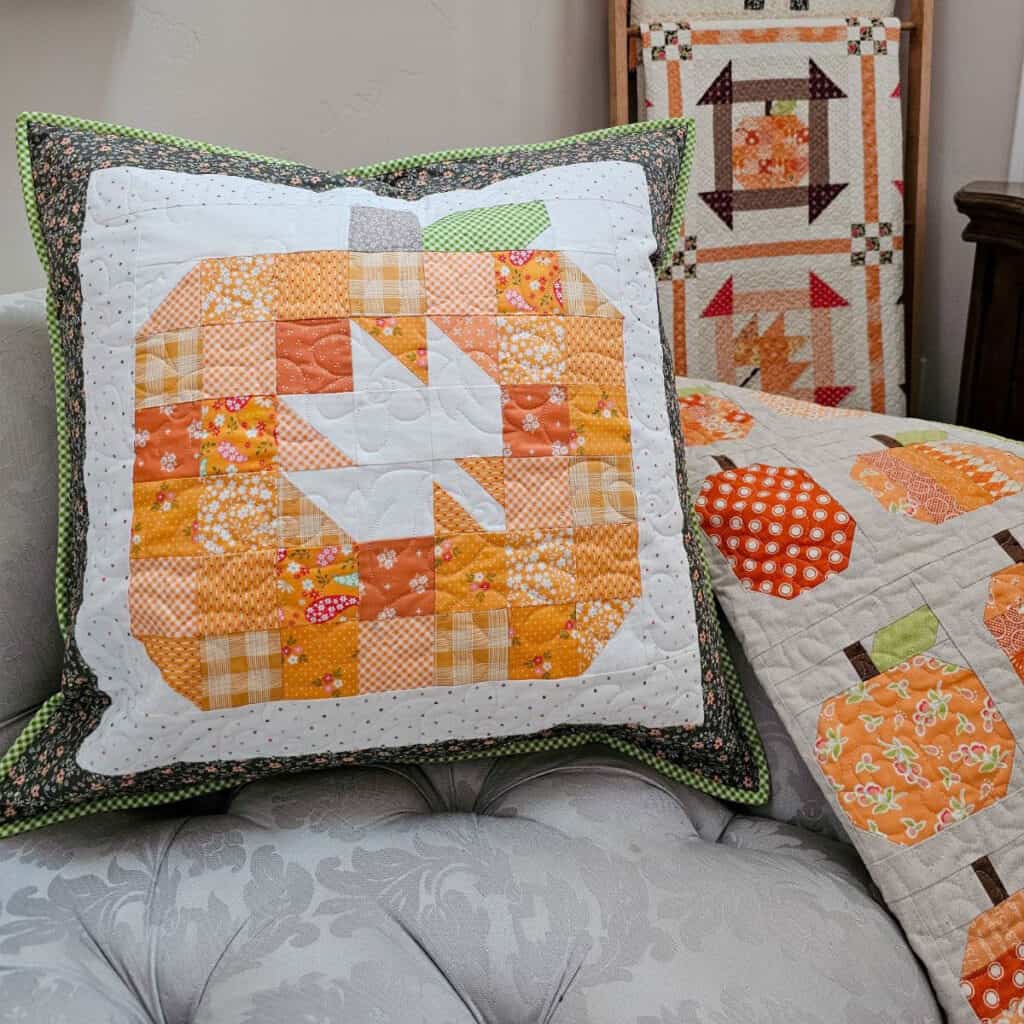 Large patchwork pumpkin pillow pieced by Sherri from A Quilting Life