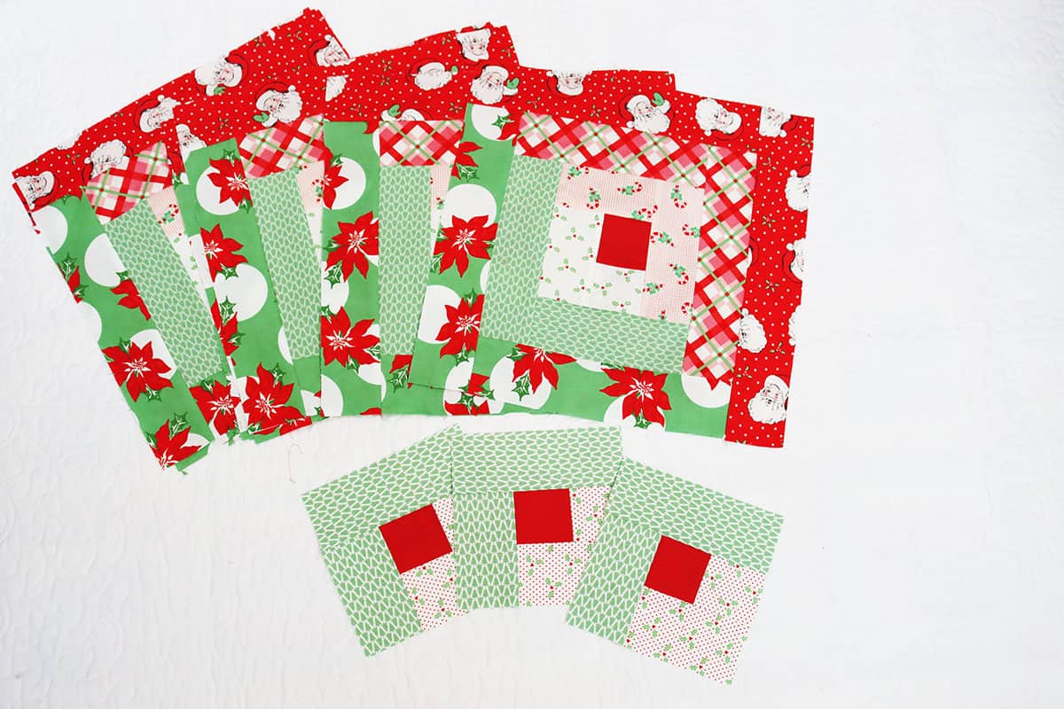 Swell Christmas Log Cabin blocks finished and in progress