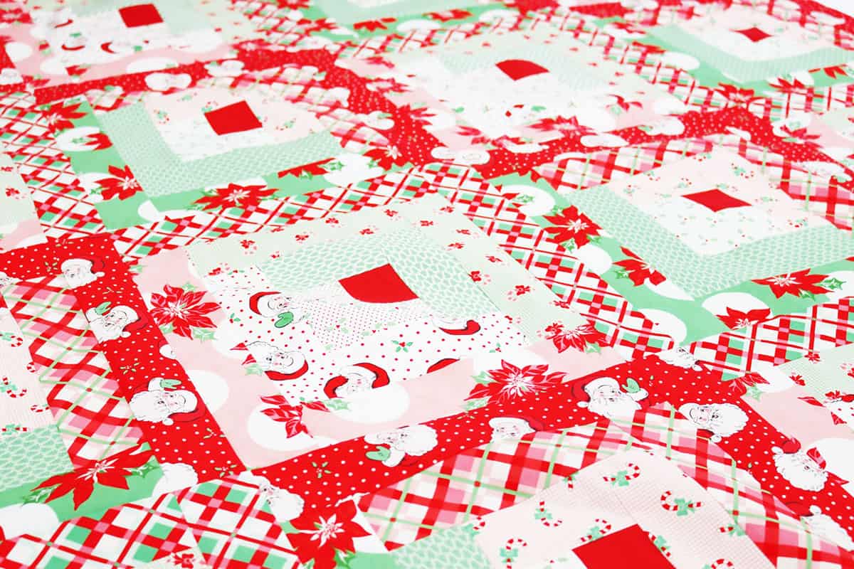 Christmas Log Cabin quilt by Sherri from A Quilting Life