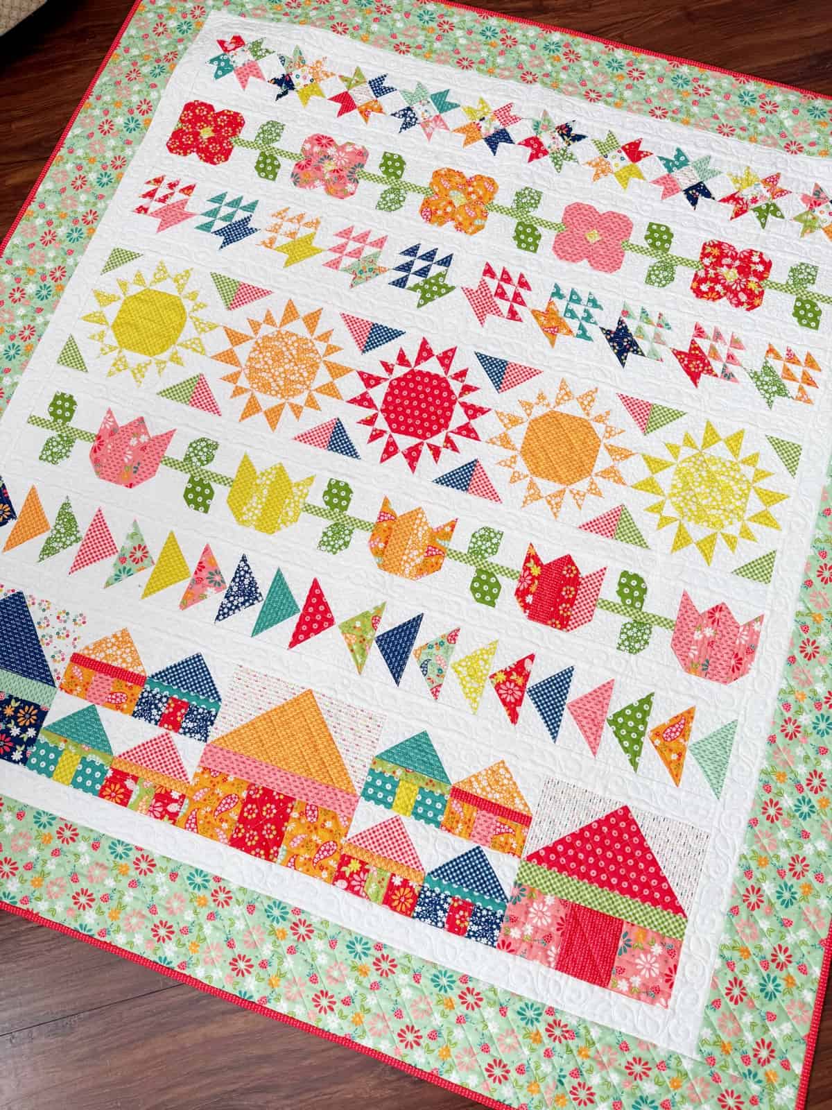 Harbor Row Quilt in Raspberry Summer Fabrics by Sherri from A Quilting Life