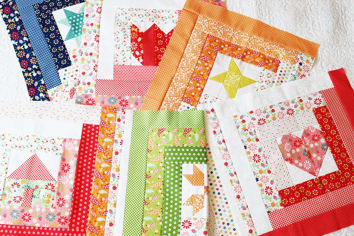 A Quilting Life Block of the Month blocks from January through June in Raspberry Summer fabrics.