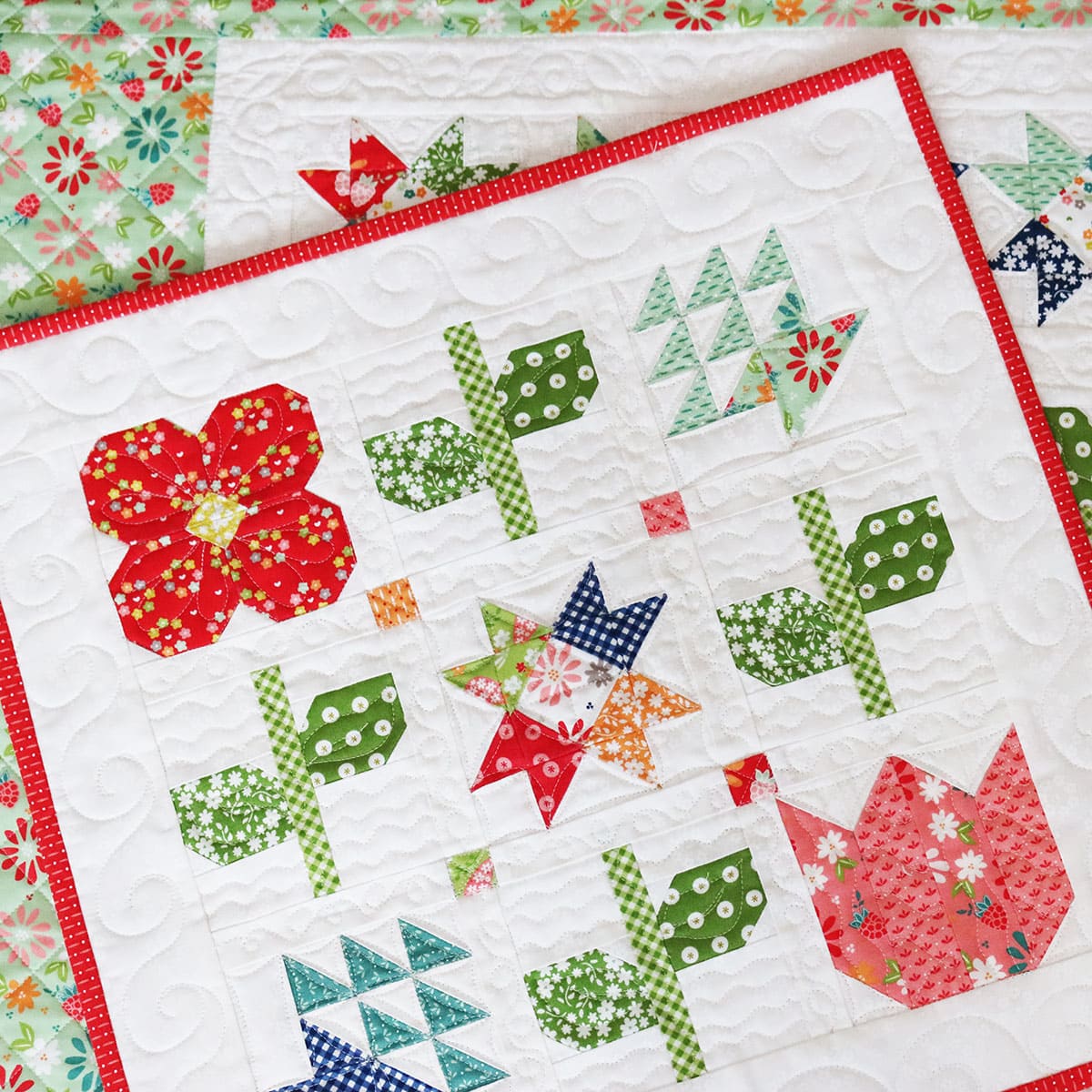 Harbor Row Quilt Mini in Raspberry Summer fabrics by Sherri & Chelsi for Moda fabrics.