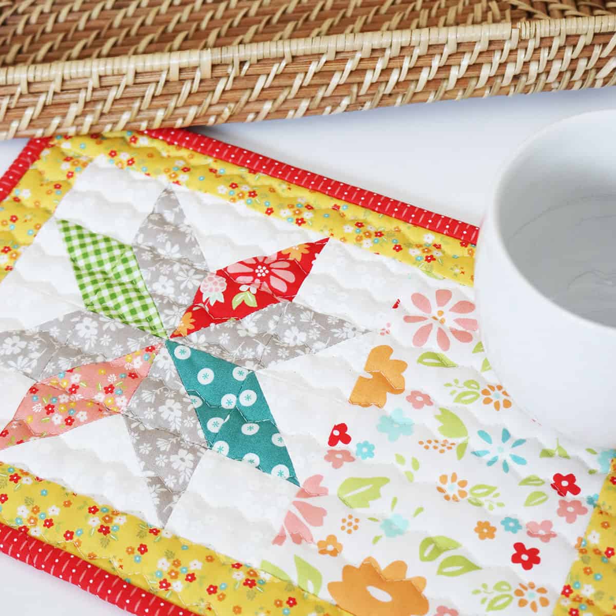 Mid-Summer Star Mug Rug by Sherri McConnell of A Quilting Life