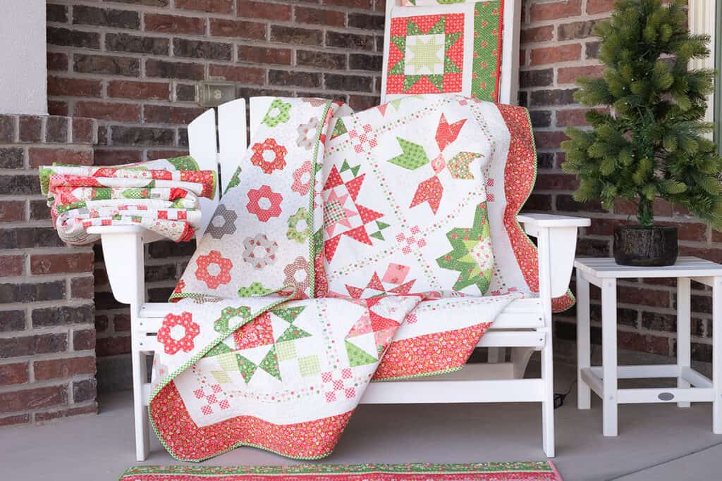 Poinsettia Stars quilt by Sherri from A Quilting Life