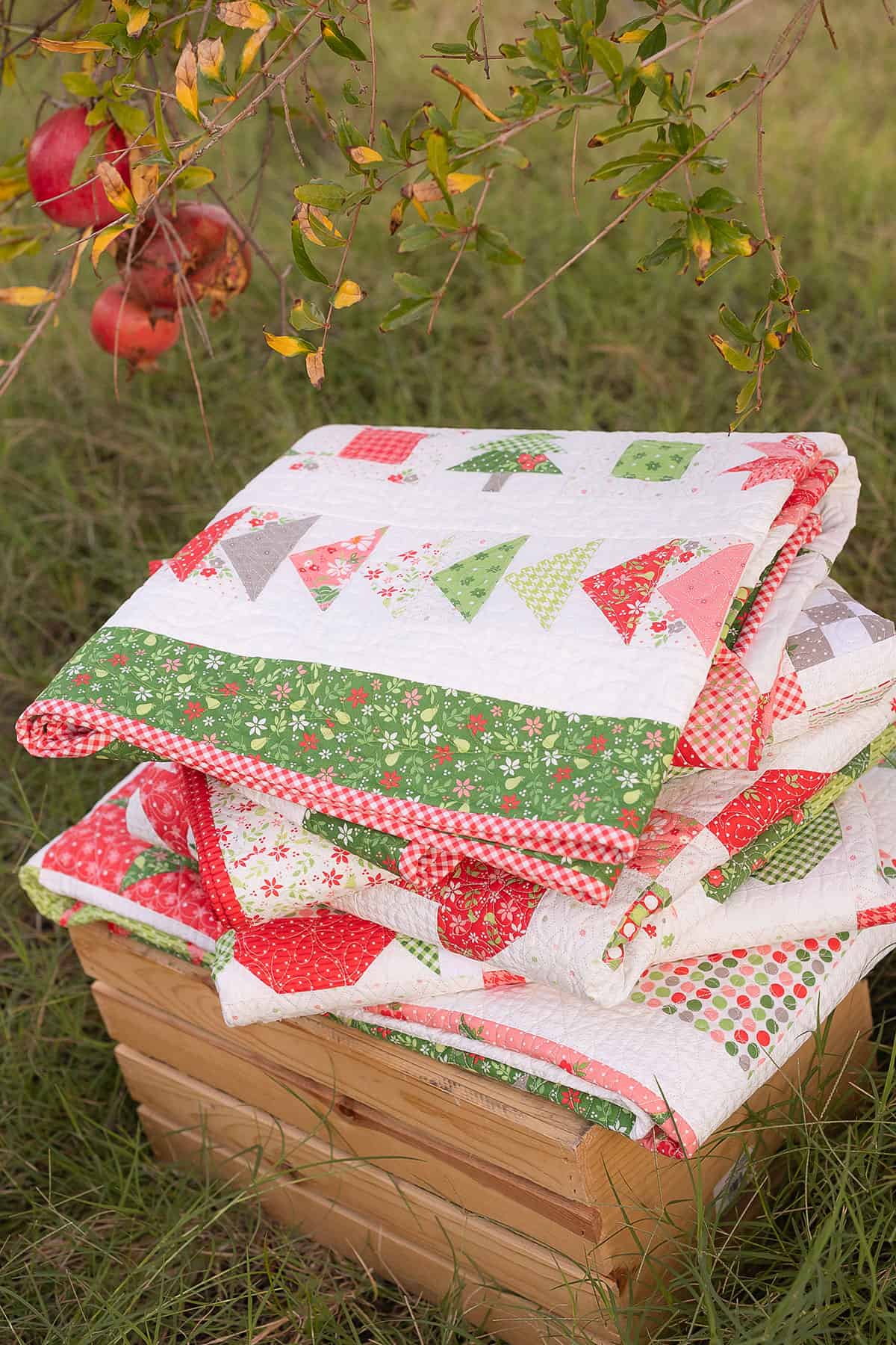 Quilt Stack in Poinsettia & Pear Fabrics by Sherri from A Quilting Life