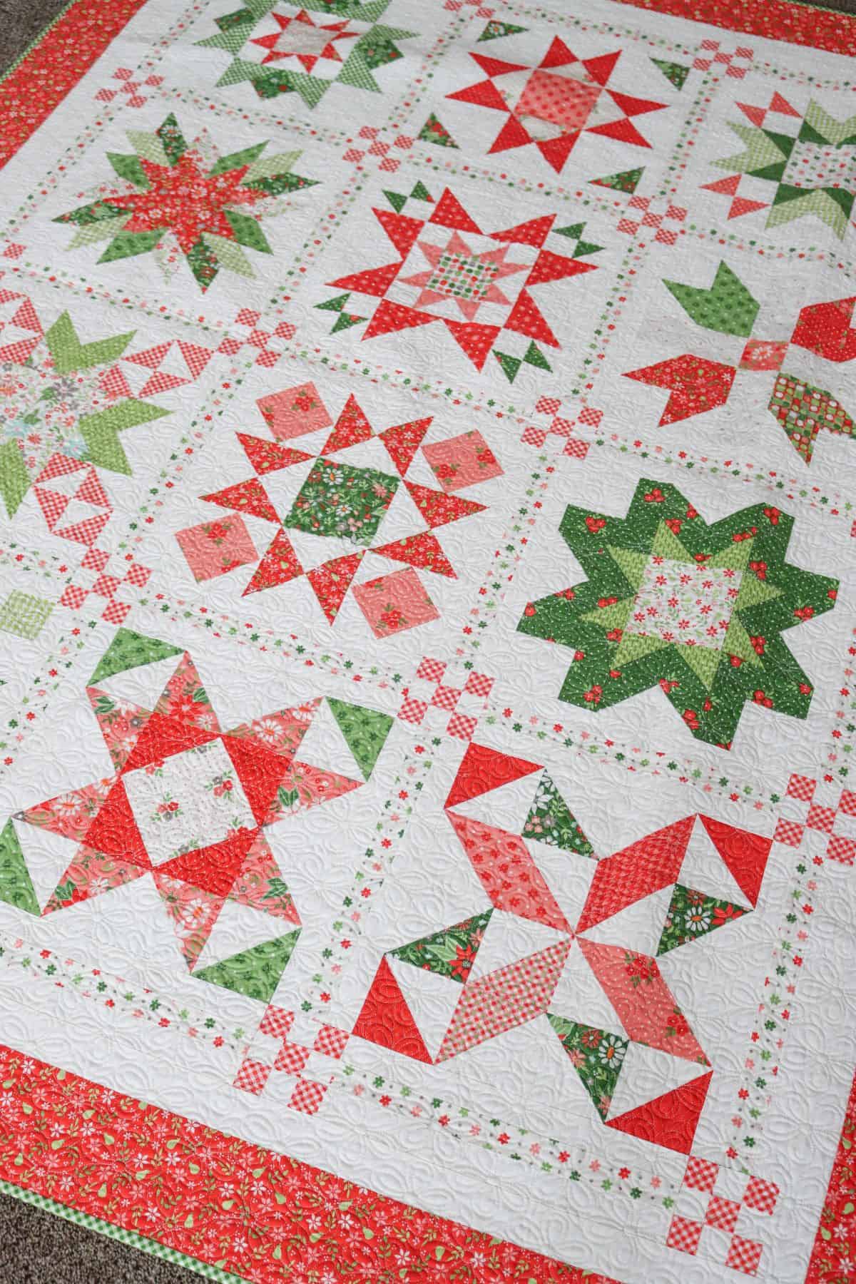 Poinsettia Stars Block of the Month in Poinsettia & Pear fabrics by Sherri & Chelsi for Moda Fabrics